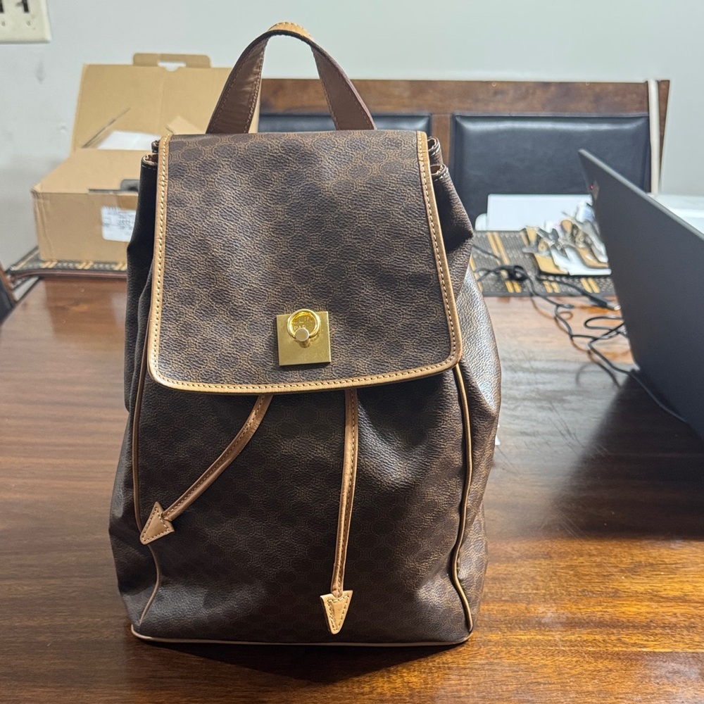 Classic Brown Drawstring Backpack with Gold Hardware
